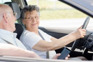 elderly drivers in car