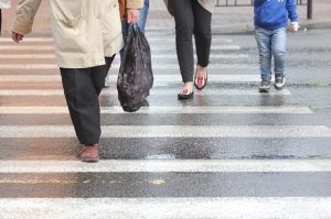 pedestrians crossing crosswalk